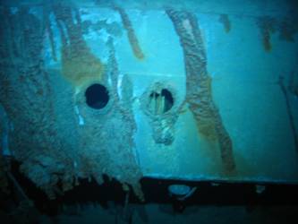 Scuttles visible on inverted port bow section